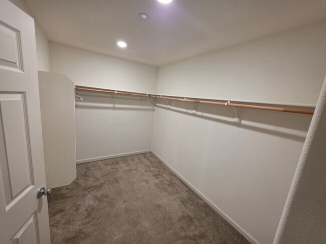 Building Photo - Spacious 5BR + Loft in Hamptons Village – Studio Suite, New HVAC, EV Charging