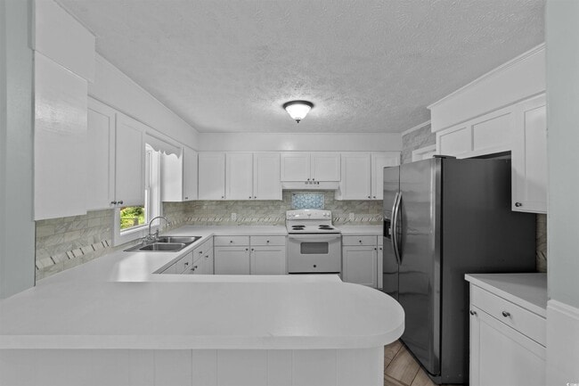 Building Photo - 1401 Twin Oaks Dr