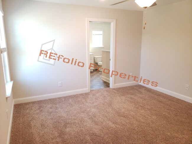 Building Photo - Charming 4 Bedroom, 2.5 Bath, 2-Car Garage...