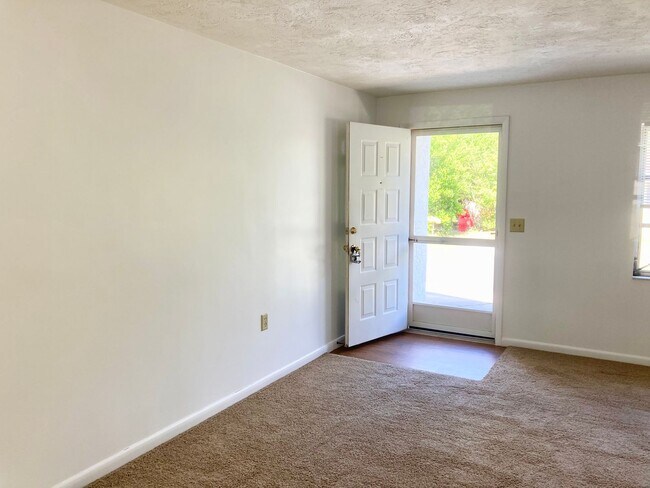 Building Photo - 2 bedroom, 1.5 bath home with carport