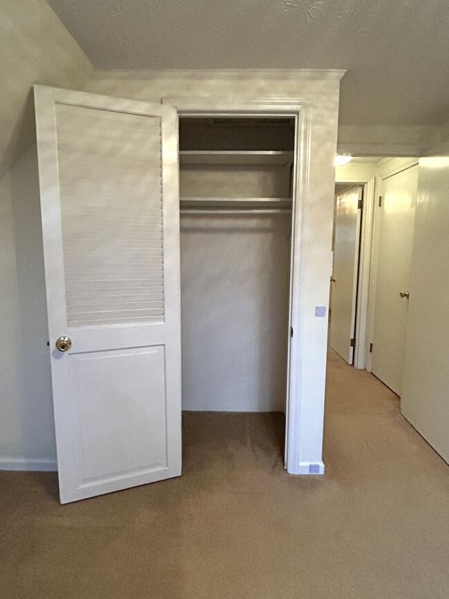 Building Photo - Light-Filled 3BR Home with Wraparound Deck, Convenient to Town