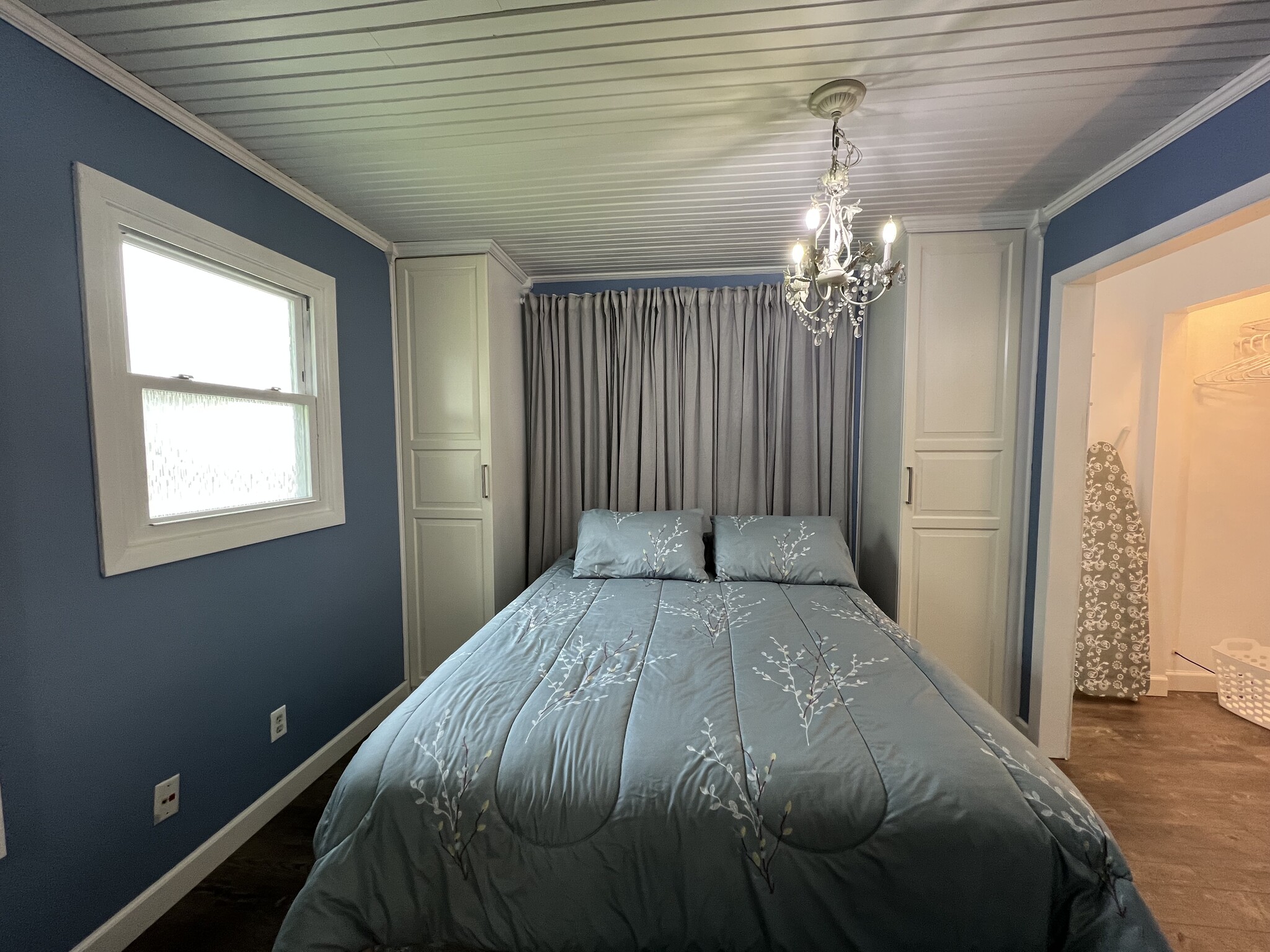 Plenty of storage in the cabinets on each side of the bed. Hanging, drawers, shelves, and baskets. - 908 Lake Rd