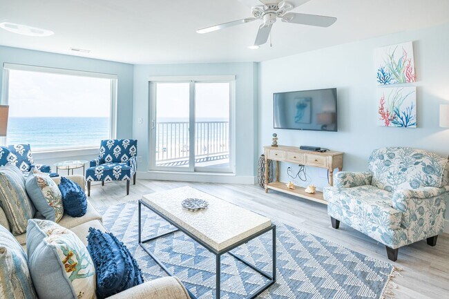 Building Photo - SPEND YOUR OFF-SEASON AT THIS TOP FLOOR OCEANFRONT CONDO