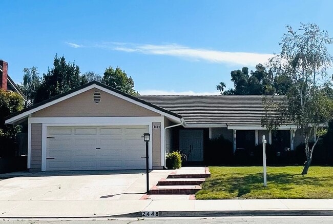 Building Photo - charming 3-bedroom, 2-bathroom home nestle...