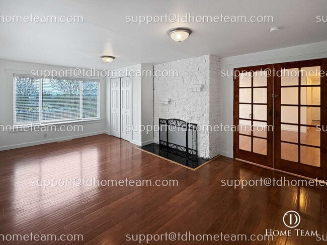 Building Photo - "Charming 4-Bed Family Home in SeaTac with Granite Countertops & Hardwood Floors!"