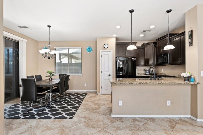 Building Photo - Welcome Home! This stunning 4 bedroom, 3 b...