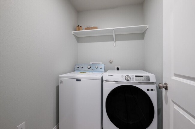 Building Photo - Open-Concept Living with New Flooring