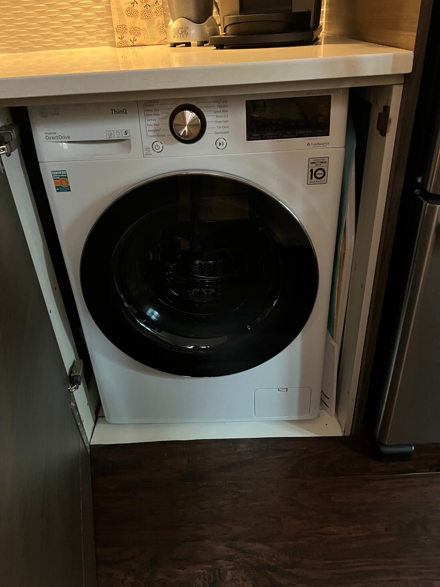 LG two-in-one washer dryer in kitchen replaced in 2022 - 3606 Rock Creek Church Rd NW