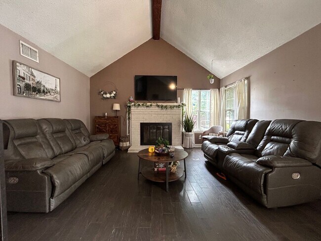 Building Photo - Introducing this fantastic townhome in the...