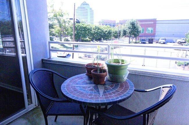 Building Photo - Downtown Durham 1bd/1ba Corner-Unit Condo with On-Site Personal 1-Car Garage!