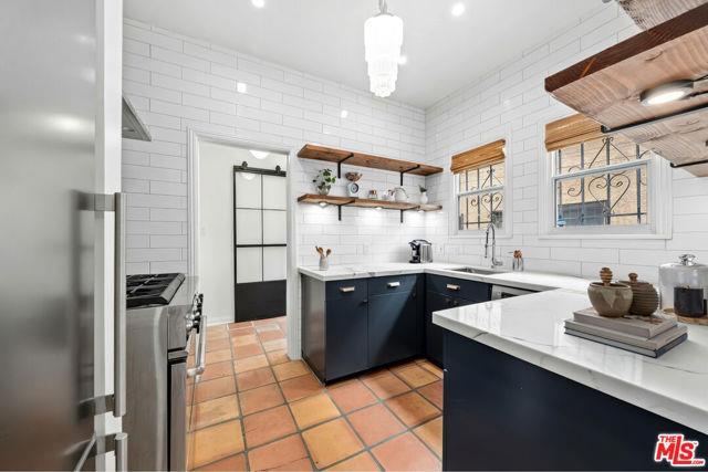 Building Photo - 6427 1/2 Orange Street, Los Angeles, CA 90...
