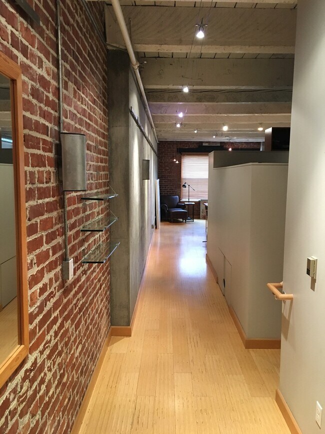 Building Photo - Historic Chown Pella Lofts - east facing studio w/parking/most utilities/rooftop deck