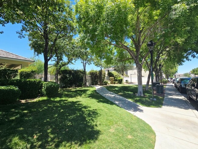 Building Photo - 8295 Golden Flowers St