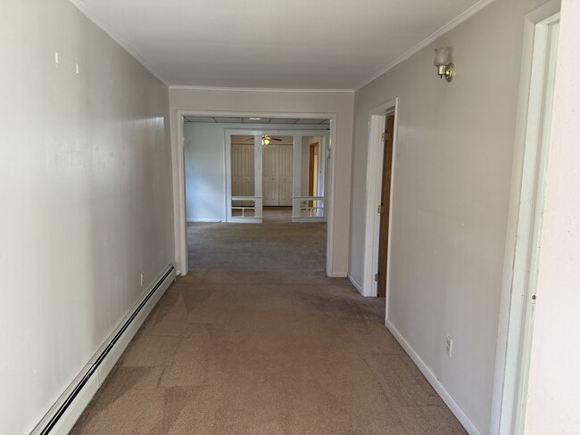 Front door looking toward living room & dining room - 22 N Maple Ave