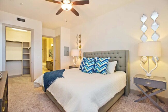 Building Photo - Making Midtown Buzz — Live in Style Today!