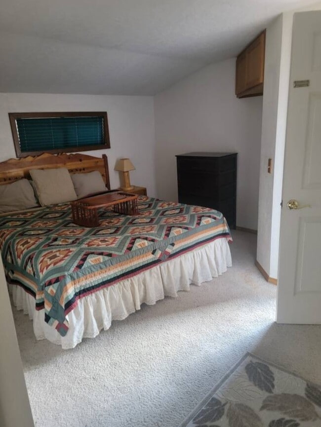 CA King bedroom has 2 cabinets and side table. - 16693 Sprague Loop