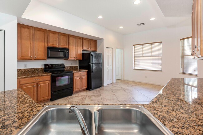 Building Photo - 3569 SW Sawgrass Villas Dr