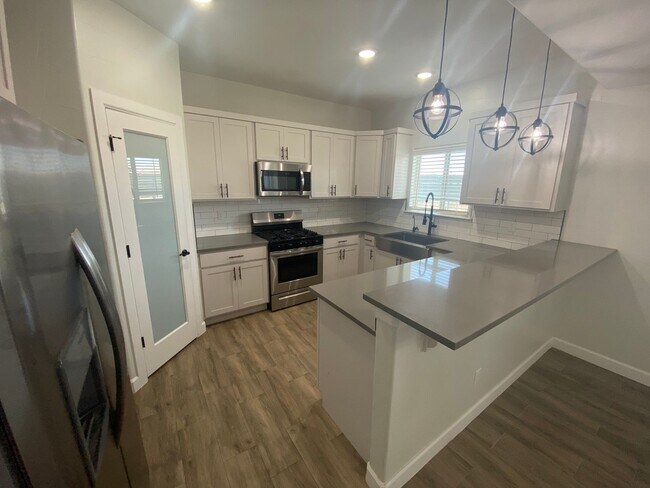 Building Photo - East El Paso 4 bed 2 bath Refrig A/C with gorgeous landscaping!