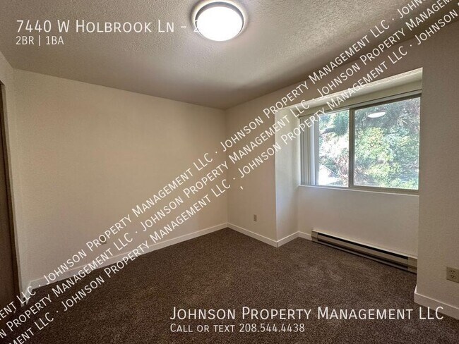 Building Photo - 7440 W Holbrook Ln