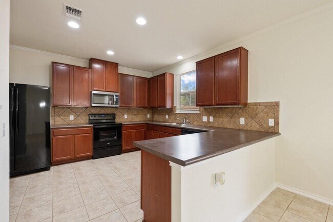 Building Photo - 10909 Helms Deep Dr