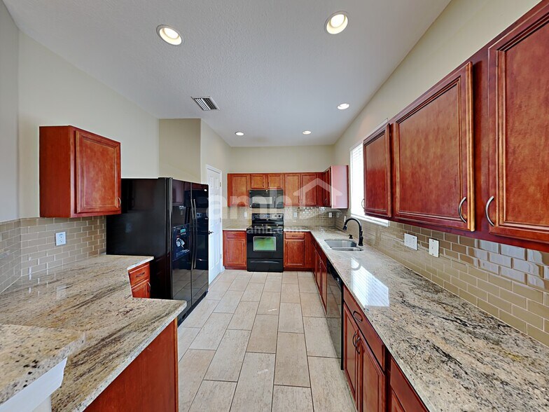 Building Photo - 18804 Sunterra Dr