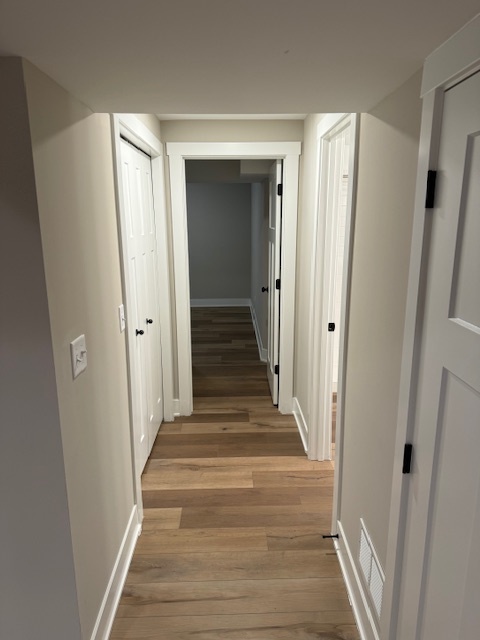 Hallway - Closet on the left, Bathroom on the right, Bedroom ahead - 823 N Maple St