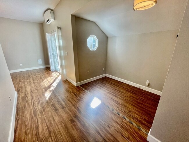 Building Photo - Prime Location! Modern 2BD/1 BA with A/C & EV Charging Steps from Mississippi