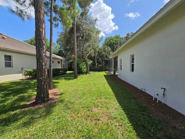 east side of home plenty of room between the buildings - 2063 Imperial Cir