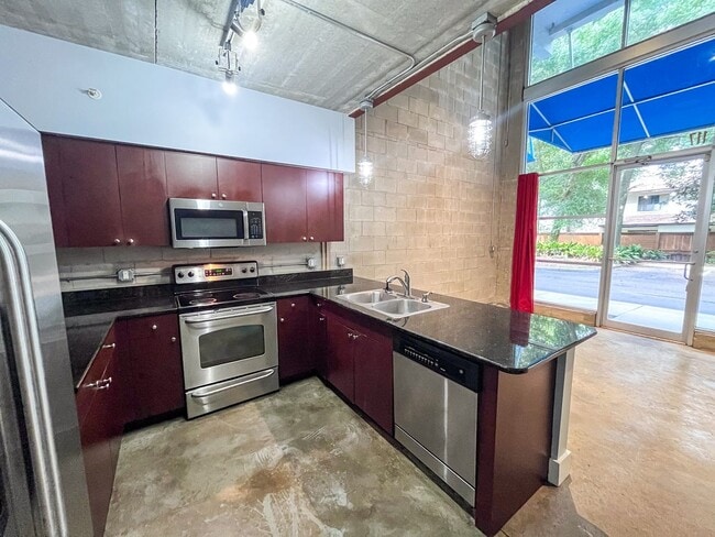 Building Photo - Lofts Oasis #117