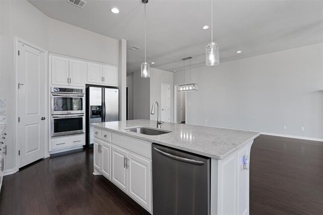 Building Photo - 404 Miracle Rose Way