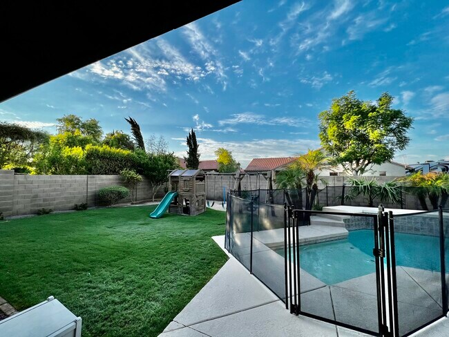 Building Photo - 8443 Forget Me not St