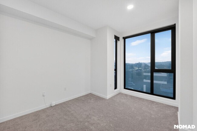 Building Photo - Act Fast: Luxury SoMa Corner Unit w/ EV Parking & Views