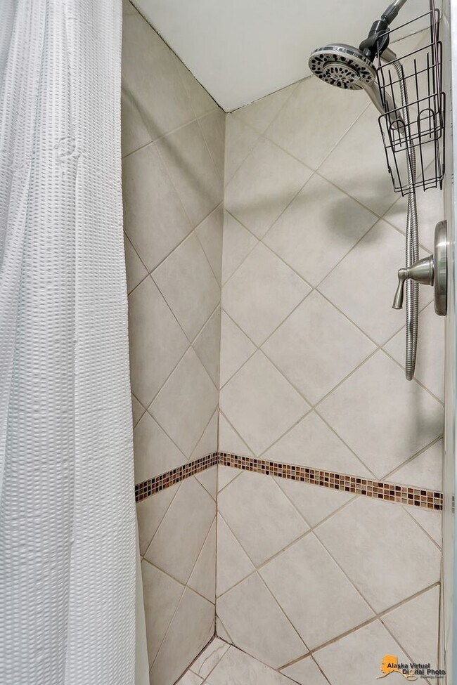 Building Photo - Eagle River Home w/ Fenced Yard, Sunroom, and Garage!