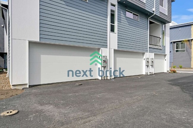 Building Photo - Brand-New 2026 Townhome | 3 Bed | 2.5 Bath | 1,560 Sq Ft | EV Garage | A/C Included