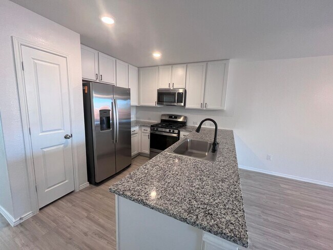 Building Photo - Move in Ready - Pet Friendly with pet door...