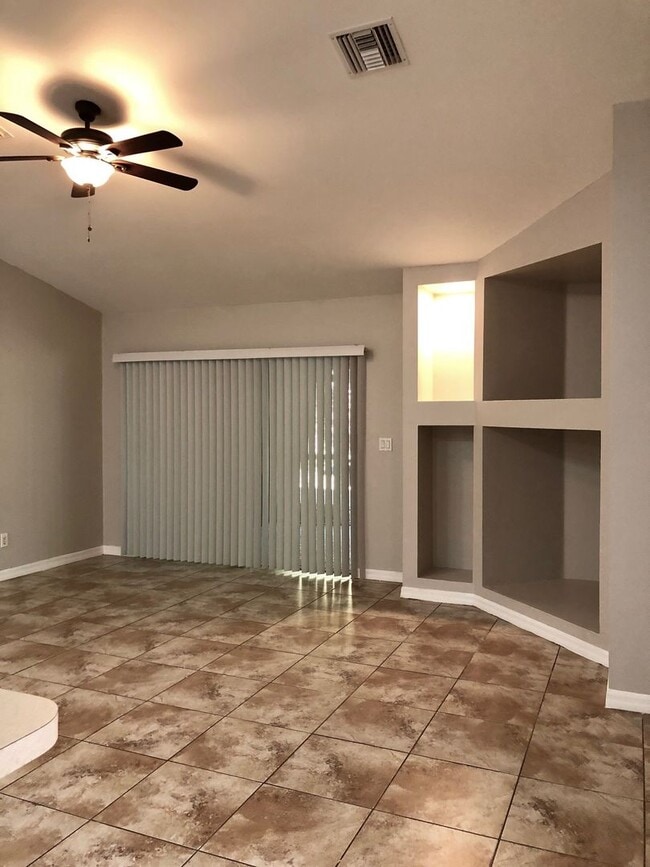 Building Photo - Experience this Large Cape Coral 3 bedroom 2 bath duplex with 1 car garage and screened in lanai.