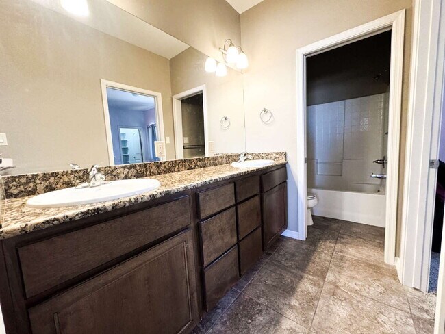 Building Photo - Spacious 4-Bed, 3-Bath Gem with 1804 Sq. F...
