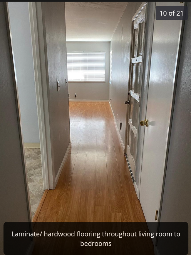 front entry to living room and kitchen - 3359 Payne Ave