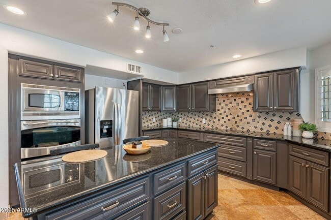 Building Photo - 12863 E Becker Ln