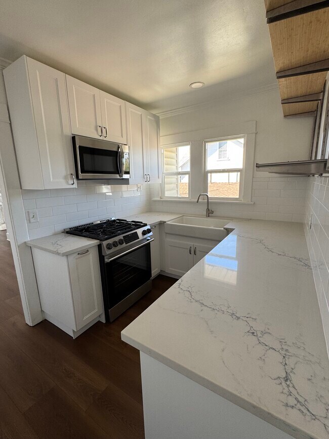 Renovated Kitchen with New Appliances - 2030 6th Ave