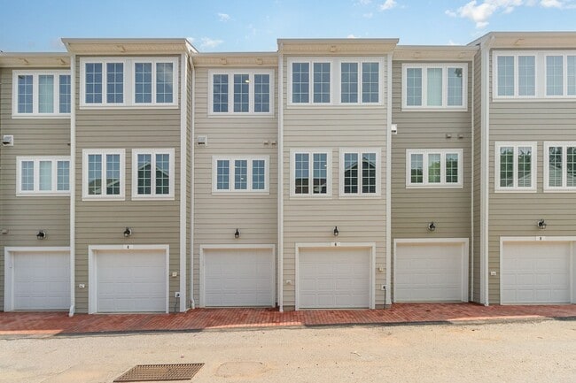 Building Photo - Modern 2025 Townhome | Open-Concept Living, Chef’s Kitchen with Large Island & 2-Car Garage