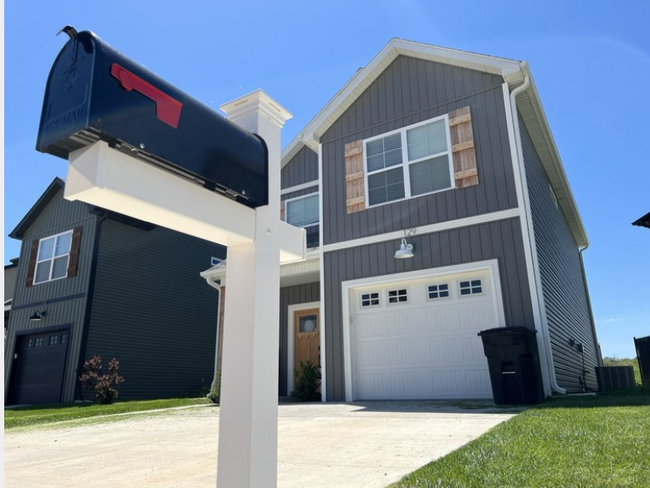 Each townhome is stand-alone featuring a driveway, mailbox, attached garage and yard area - 110 Sierra Cir