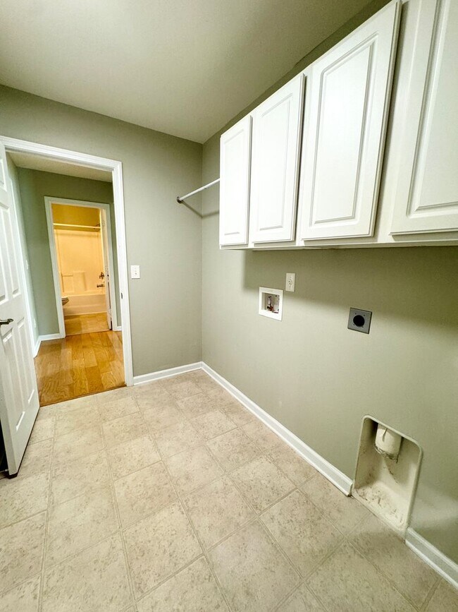 Building Photo - Like New 3 Bedroom & 2 Bath pond front home in Hillsborough! Enjoy the Community Pool, Playground...