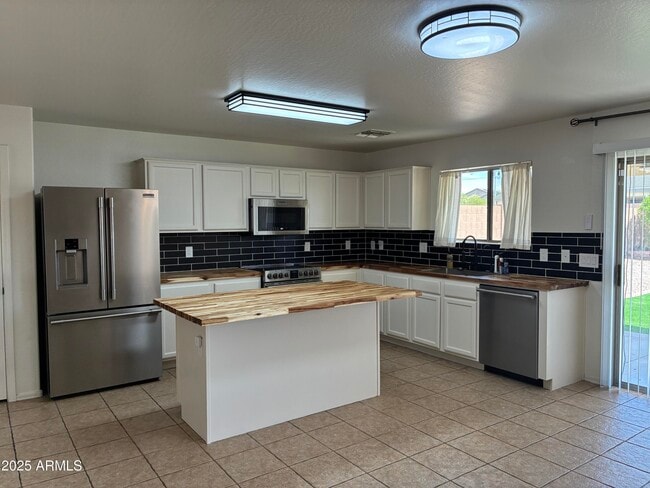Building Photo - 7287 S Sunrise Way