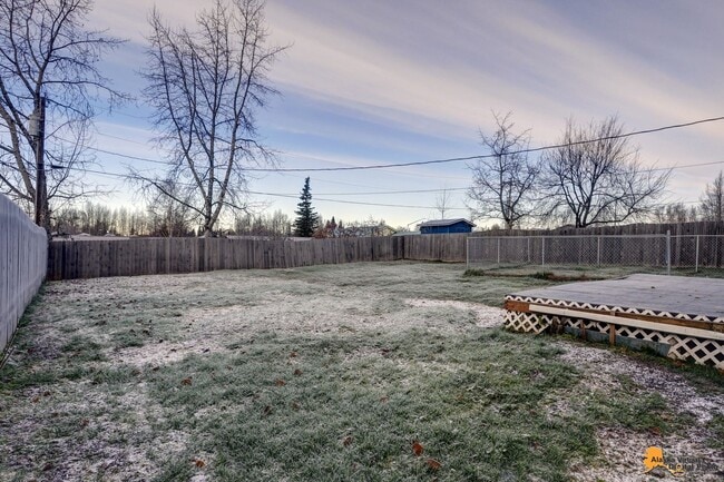 Building Photo - Cozy Abbott Loop Single Family Home w/ Garage & Fenced in Yard