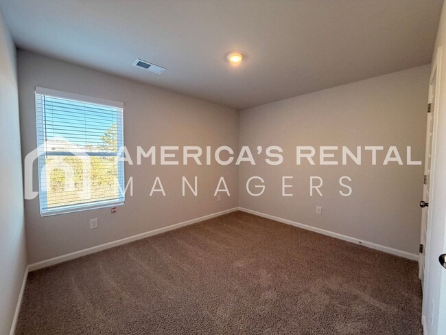 Building Photo - Spacious Two-Story Townhome with Open Layout!