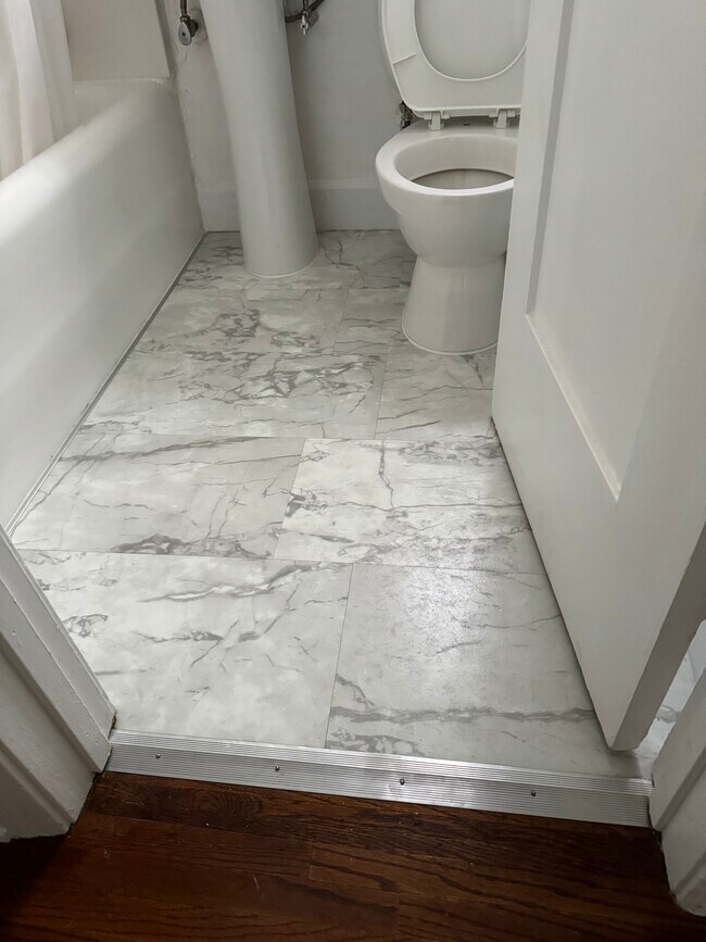 New bathroom floor - 4014 Prospect Ave