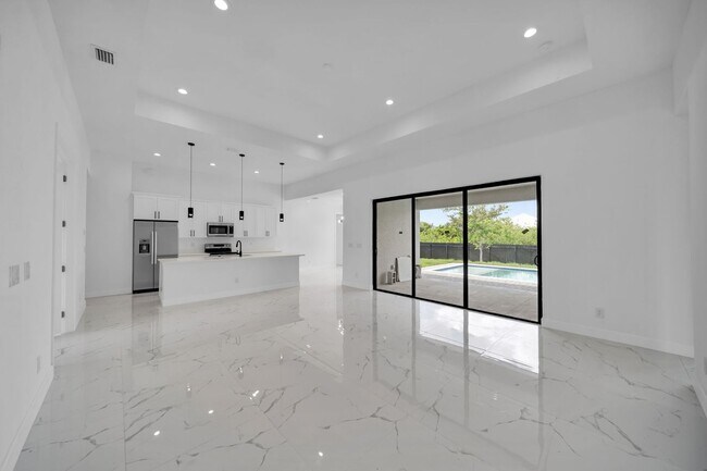 Building Photo - Brand-New Pool Home for Rent – Port Charlo...