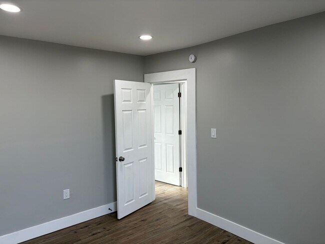 Building Photo - Newly Renovated 2- Story Townhome with Front Porch and Back Yard