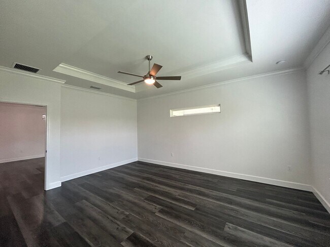 Building Photo - Immaculate 3/2 with Yard, Garage, and Pet ...
